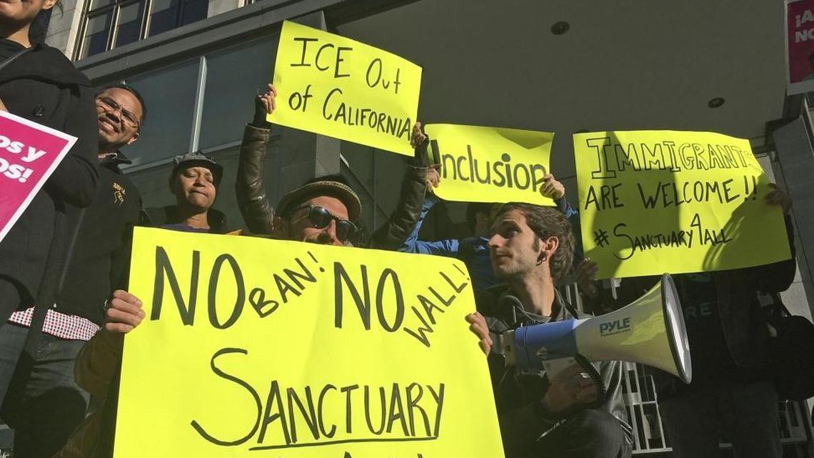 Protesters outside a San Francisco courthouse last year, site of a hearing of the first lawsuit challenging the government’s ability to withhold grants from sanctuary cities.