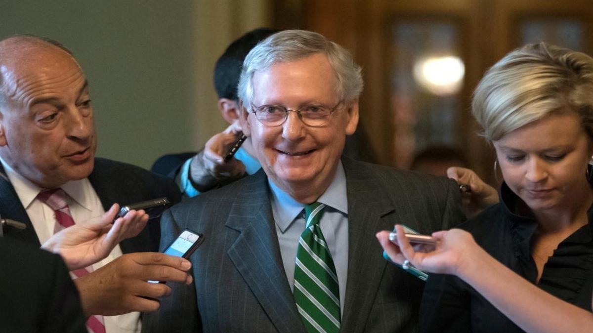 Senate Majority leader Mitch McConnell smiles as he leaves the chamber after announcing the release of the Republicans' healthcare bill which represents the party's long-awaited attempt to scuttle much of President Barack Obama's Affordable Care Act, at the Capitol in Washington, Thursday, June 22, 2017. The measure represents the Senate GOP's effort to achieve a top tier priority for President Donald Trump and virtually all Republican members of Congress.
