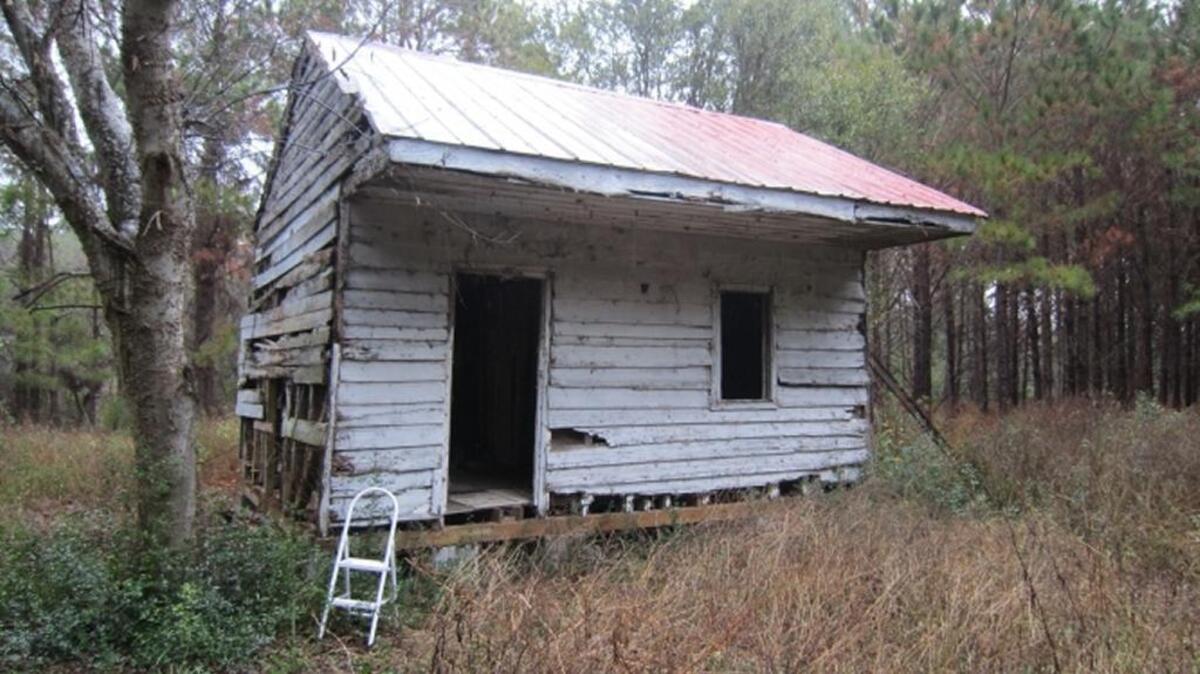A weatherboard-clad cabin used during slavery at Point of Pines Plantation on Edisto Island, S.C., circa 1800s. Opening to the public September 24, the National Museum of African American History and Culture will be a primary exhibition space of 400,000-square-foot adjacent to the Washington Monument.