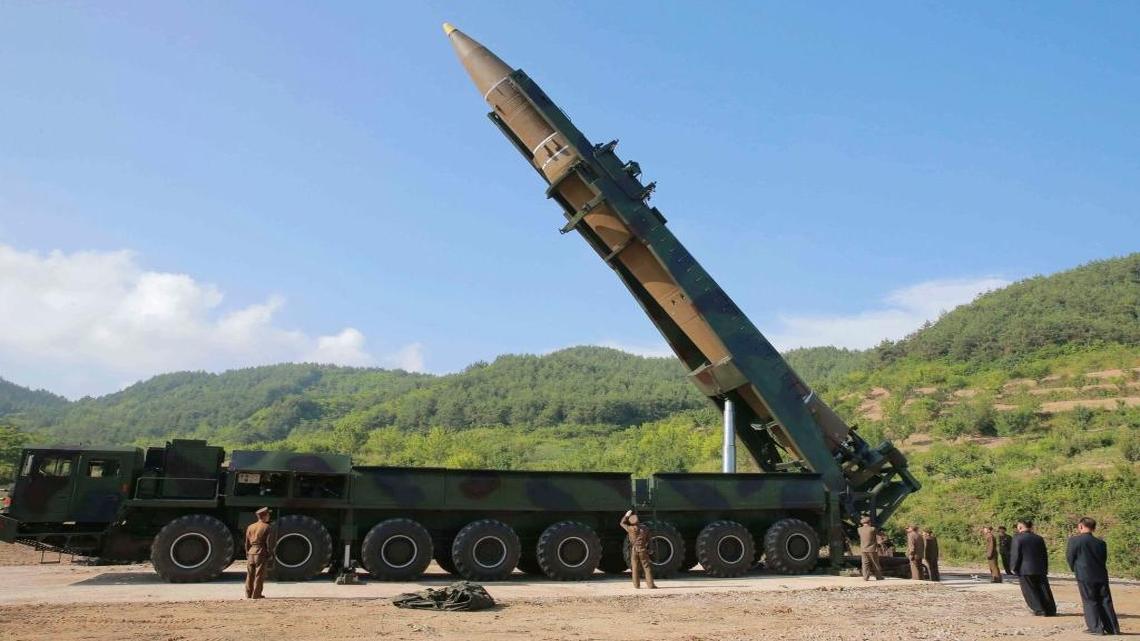 North Korean leader Kim Jong Un, second from right, inspects a Hwasong-14 intercontinental ballistic missile in North Korea’s northwest in this July 4 file photo, distributed by the North Korean government. As North Korea advances its weapons systems, an increasing number of South Korean lawmakers say the south should develop its own nuclear arsenal.