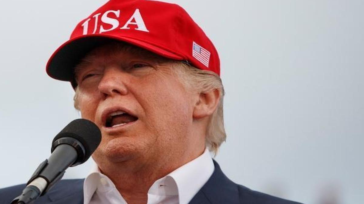 FILE - In this Saturday, Dec. 17, 2016, file photo, President-elect Donald Trump speaks during a rally at Ladd-Peebles Stadium in Mobile, Ala. Trump is poised to meet with his incoming national security adviser on Wednesday, Dec. 20, in the aftermath of a rattling day of violence around the world.