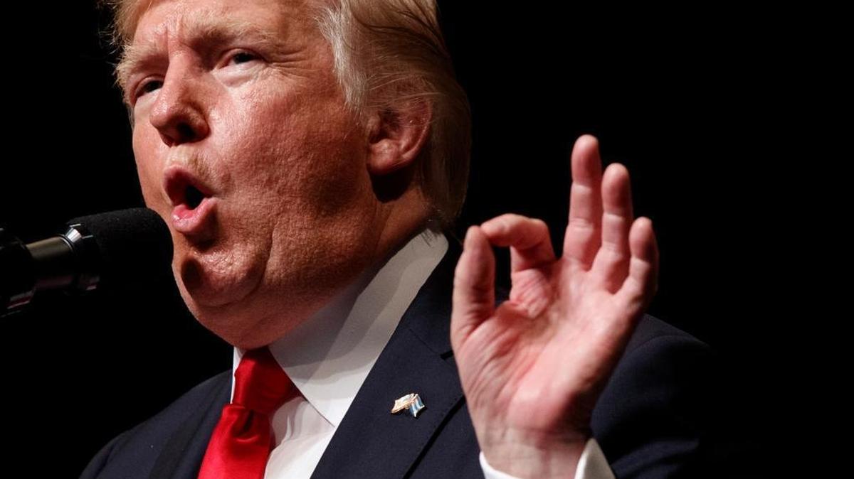 President Donald Trump speaks about Cuba policy, Friday, June 16, 2017, in Miami. He looms over the South Carolina special election, days before Election Day.