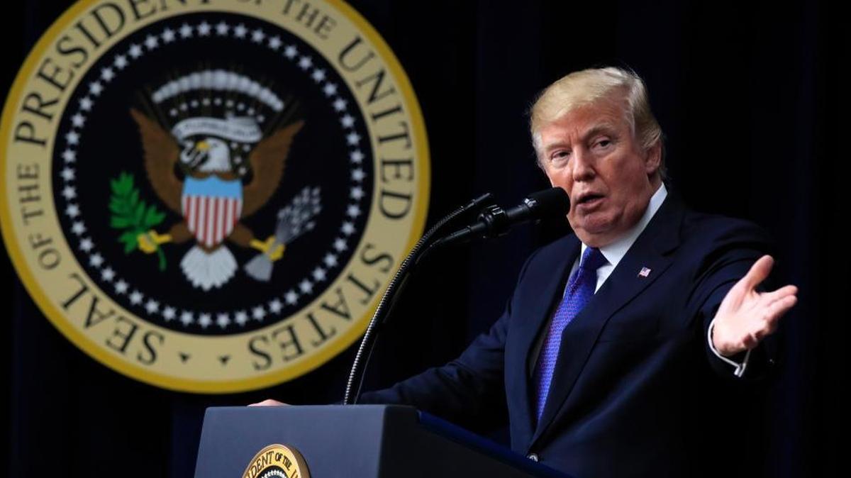 President Donald Trump speaks at the Conversations with the Women of America at the Eisenhower Executive Office Building on the White House complex in Washington on Tuesday.