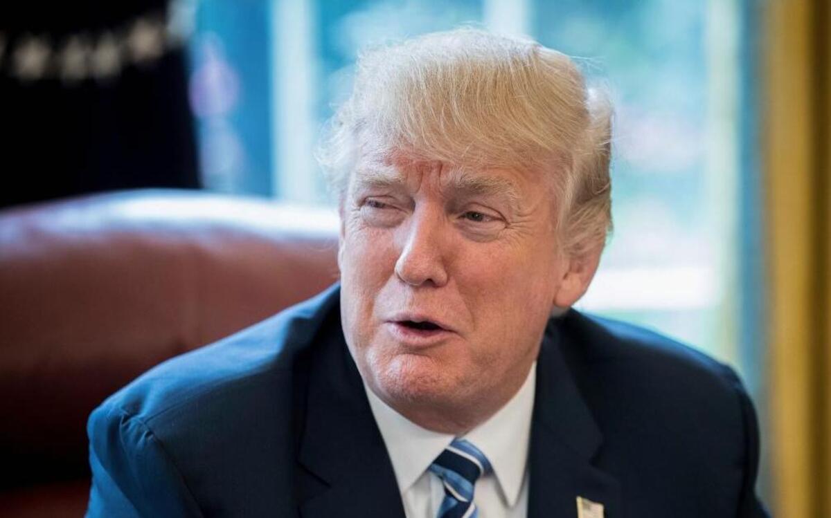 President Donald Trump speaks in the Oval Office in Washington.