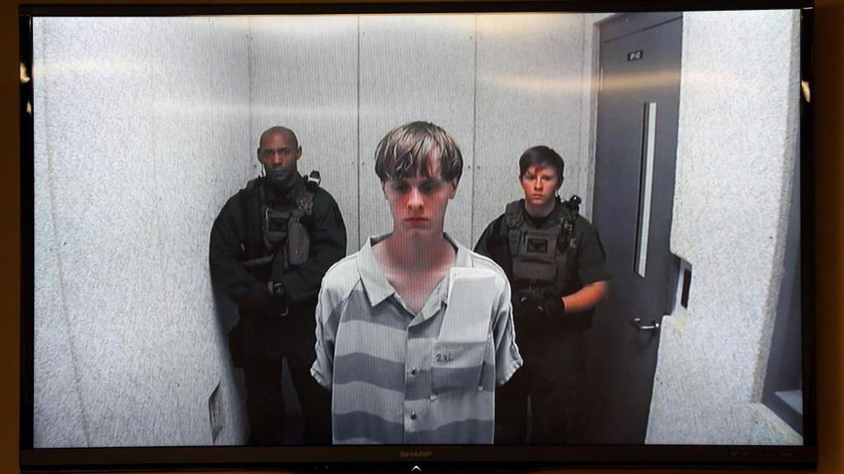 Dylann Roof appears, at a bond hearing court in North Charleston, S.C. A proposal up for debate next year seeks to close the loophole that allowed accused murderer Dylann Roof to buy the gun used to kill nine black parishioners in Charleston last June.