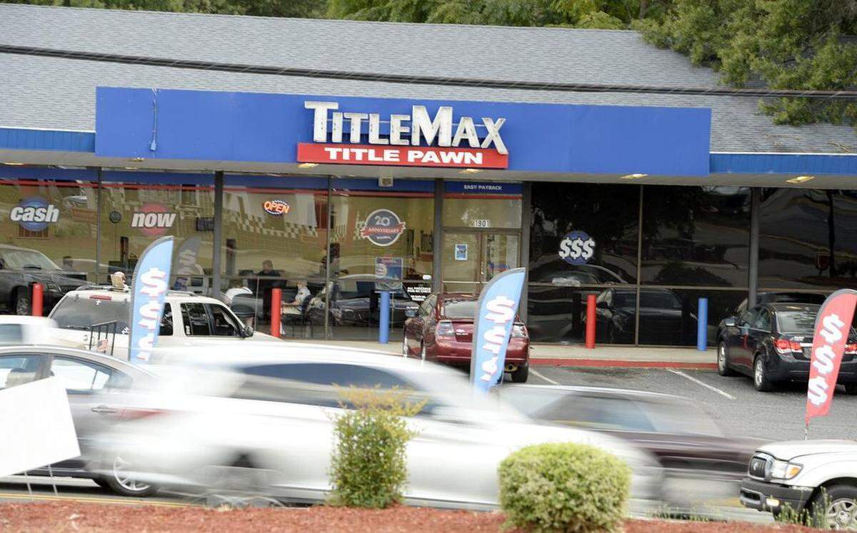 Watson Boulevard west of Robins Air Force Base is home to several title pawn businesses.