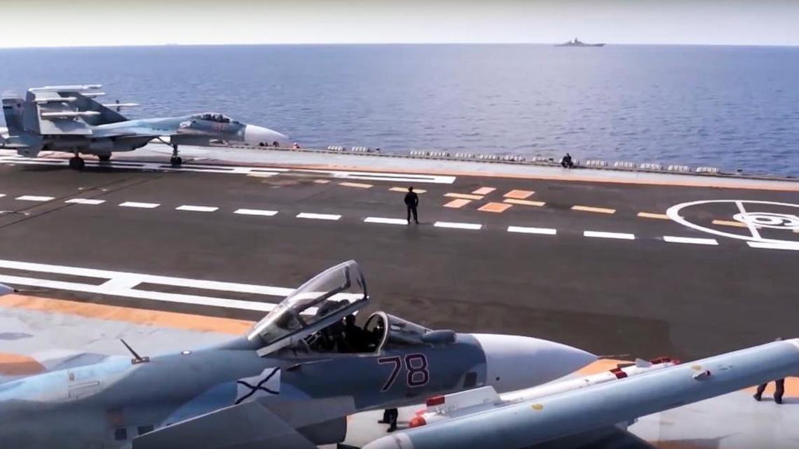 Russia’s new style of war goes beyond battlefield and includes “politics, morale, economics and governance” a new NATO report indicates. This November 15, 2016 file photo taken from Russian Defense Ministry official web site shows Russian Su-33 fighter jets on the flight deck of an aircraft carrier in the eastern Mediterranean Sea.