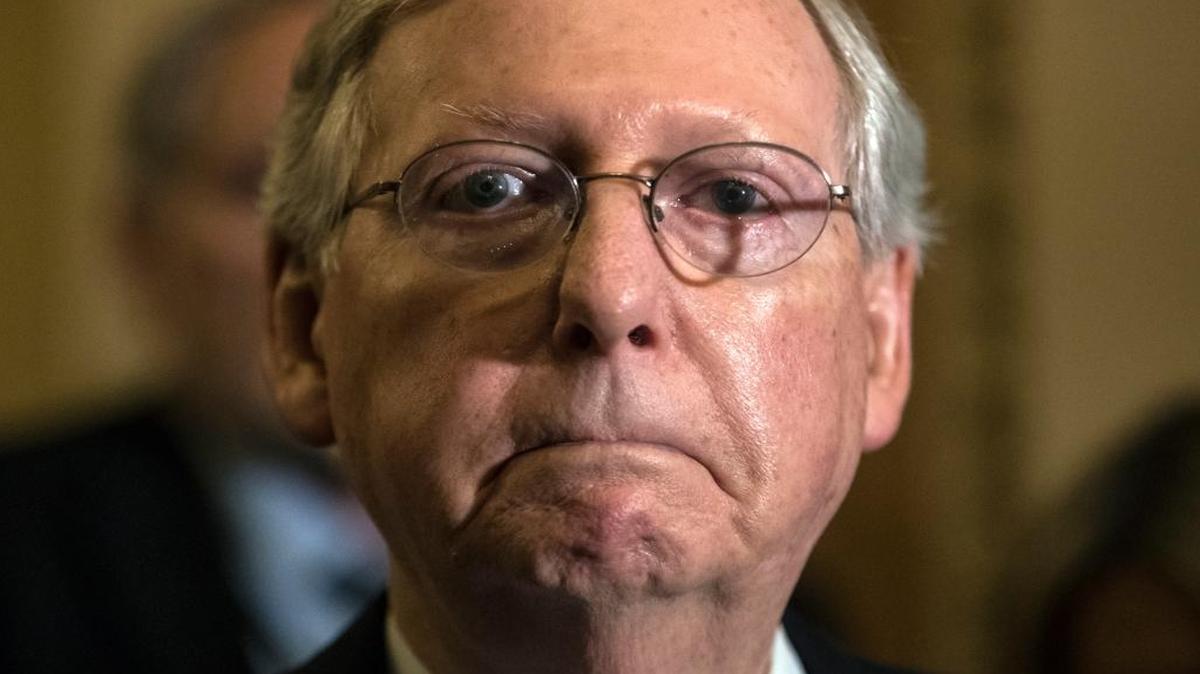 Senate Majority Leader Mitch McConnell, R-Ky., tells reporters he is delaying a vote on the Republican health care bill while GOP leadership works toward getting enough votes, at the Capitol in Washington, Tuesday, June 27, 2017. In a bruising setback, Senate Republican leaders are delaying a vote on their prized health care bill until after the July 4 recess, forced to retreat by a GOP rebellion that left them lacking enough votes to even begin debating the legislation, two sources said Tuesday.