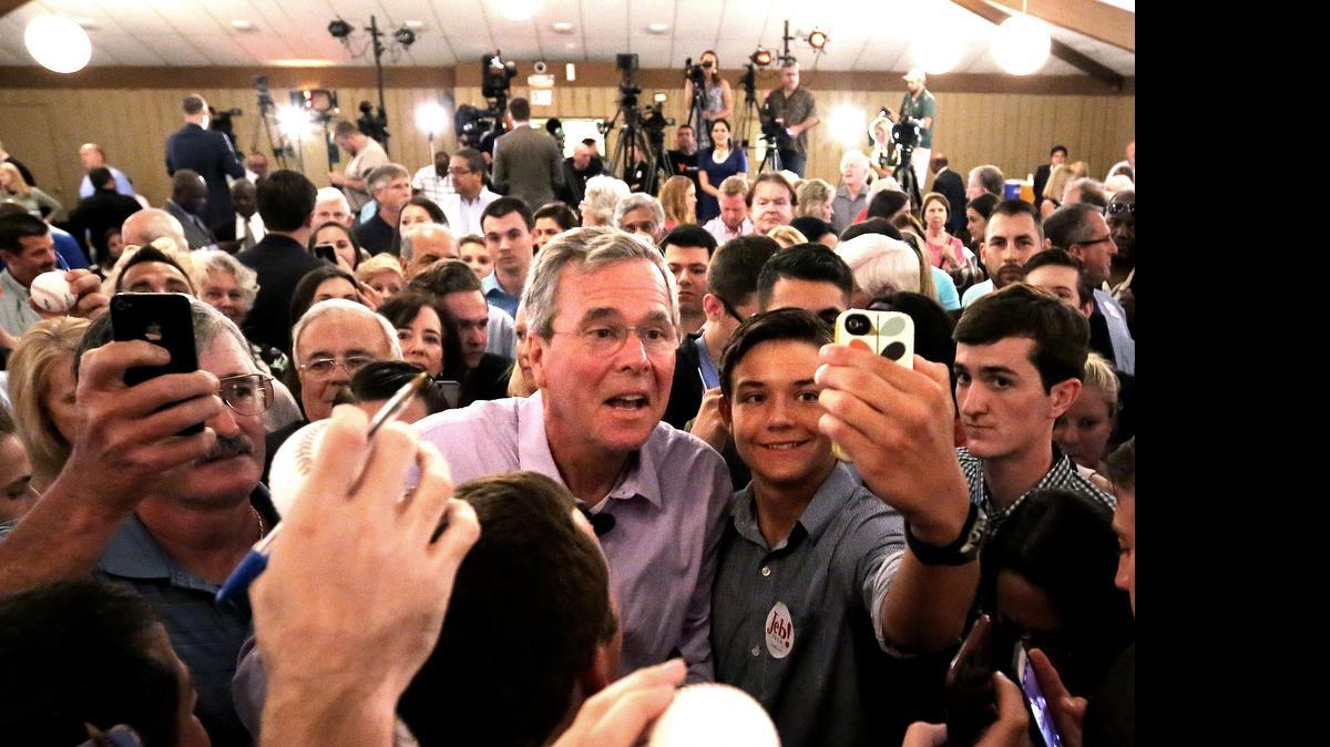 
2016 Republican presidential candidate Jeb Bush greets supporters during a campaign rally at the Maitland Venue in Maitland, Fla., Monday, July 27, 2015.
