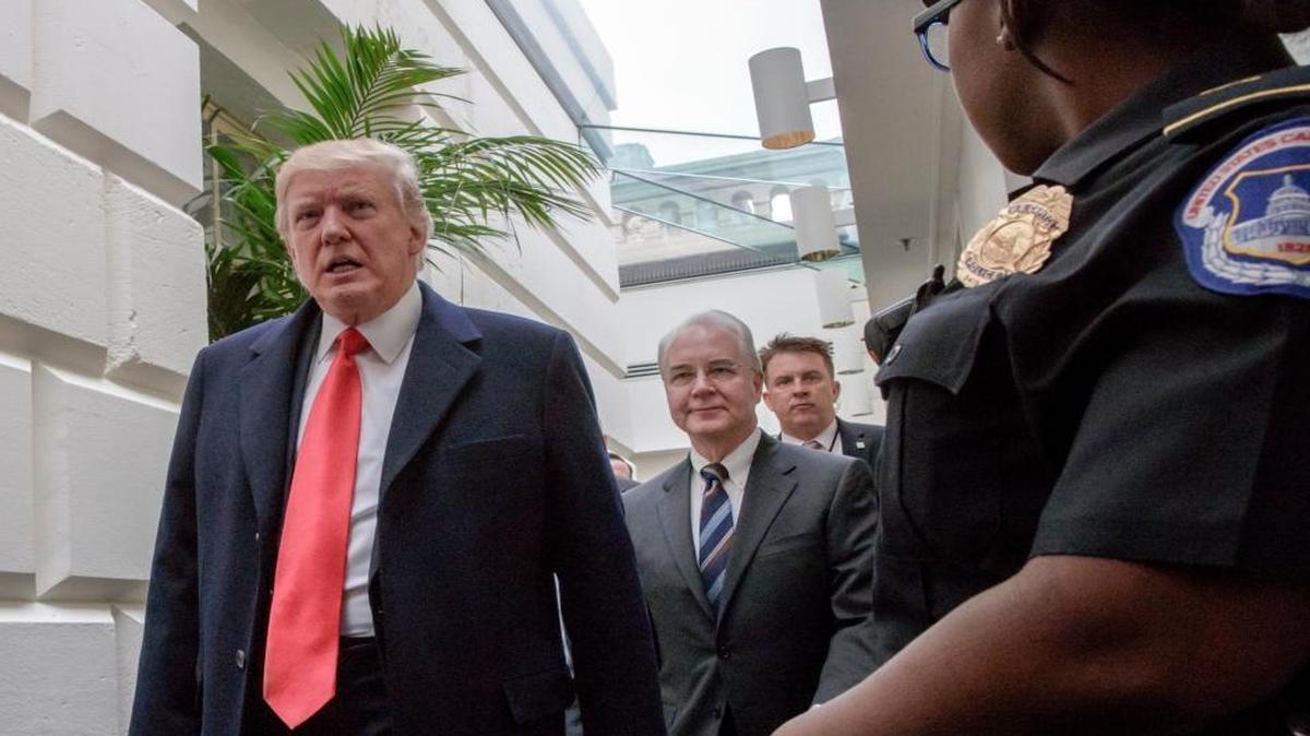 President Donald Trump, followed by Health and Human Services Secretary Tom Price, far right, leaves Capitol Hill in Washington, Tuesday, March 21, 2017, after rallying support for the Republican health care overhaul with GOP lawmakers.