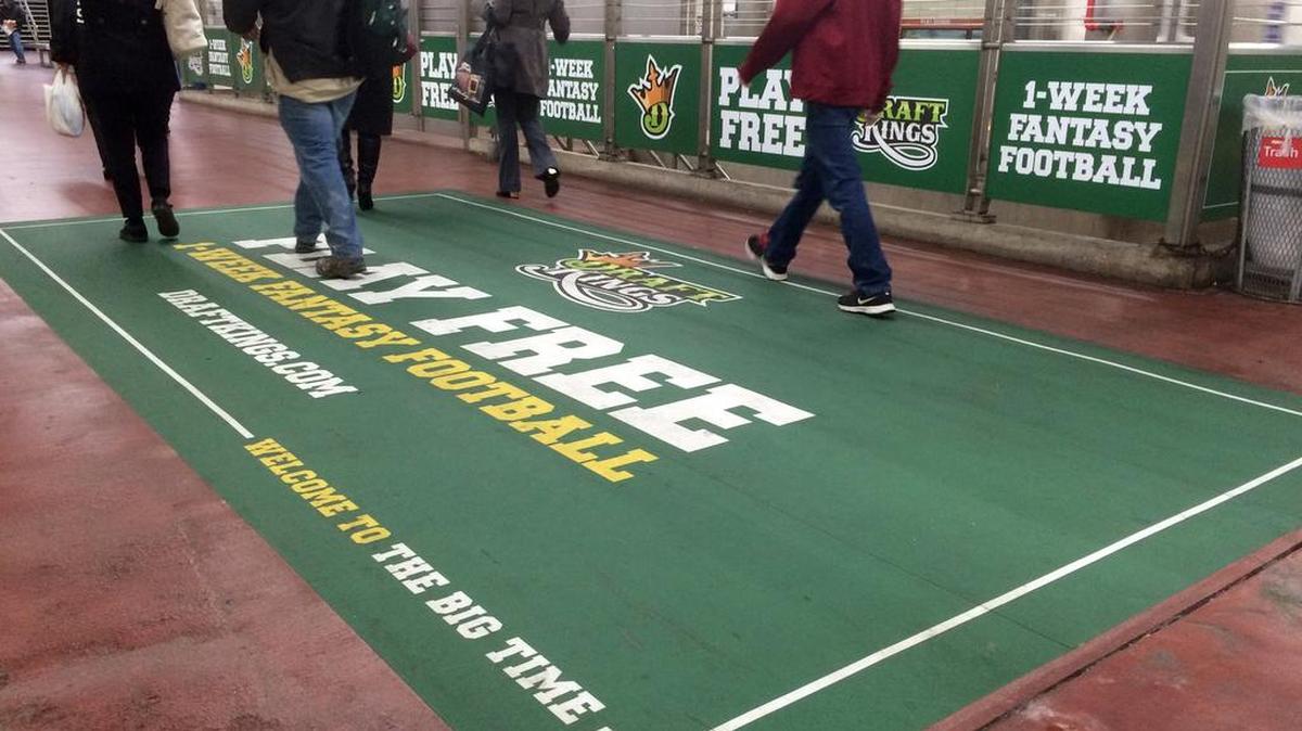 An ad for daily fantasy sports operator DraftKings is displayed in a subway station in Philadelphia. Leading daily fantasy sports companies on Wednesday pledged their cooperation to the California Legislature to pass regulations that will keep the booming online game operating in the nation’s largest state.