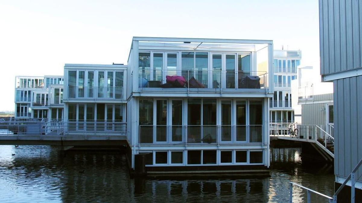 In this photo taken March 28, 2012, amphibious houses are seen in the harbor of the IJburg neighborhood in Amsterdam. IJburg is a new district in the eastern part of town that’s surrounded by water. The Netherlands, a third of which lies below sea level, has been managing water since the Middle Ages and has thus emerged as a pioneer in the field, exporting its expertise to Indonesia, China, Thailand, Dubai and the Republic of the Maldives, an Indian Ocean archipelago that, with a maximum elevation of about 8 feet, is the world's lowest country.