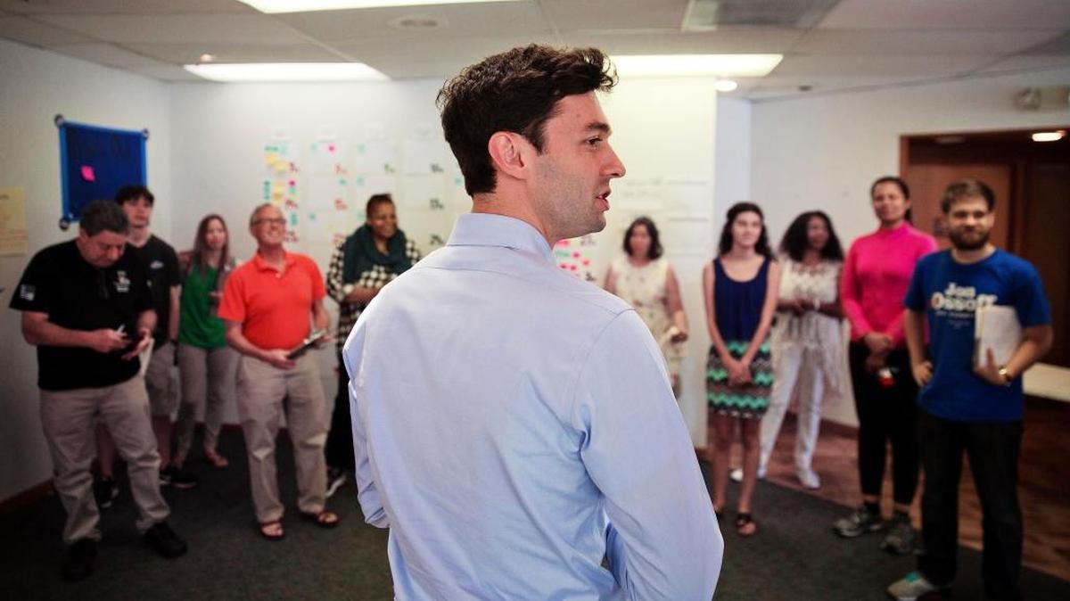 Jon Ossoff, a 30-year-old Democrat running for Congress in Georgia's traditionally conservative 6th Congressional District, talks to volunteers in his campaign office.