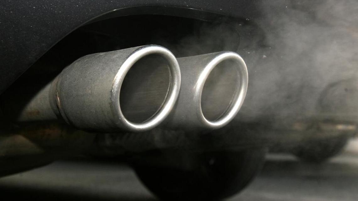 Exhaust wafts from a car tailpipe in this 2009 photo from Olympia, Washington. California, Washington and other states have adopted tailpipe emission rules stronger than the federal standard. Recent rhetoric from EPA Administrator Scott Pruitt has heightened fears the Trump administration may seek to block those states from implementing their standards.