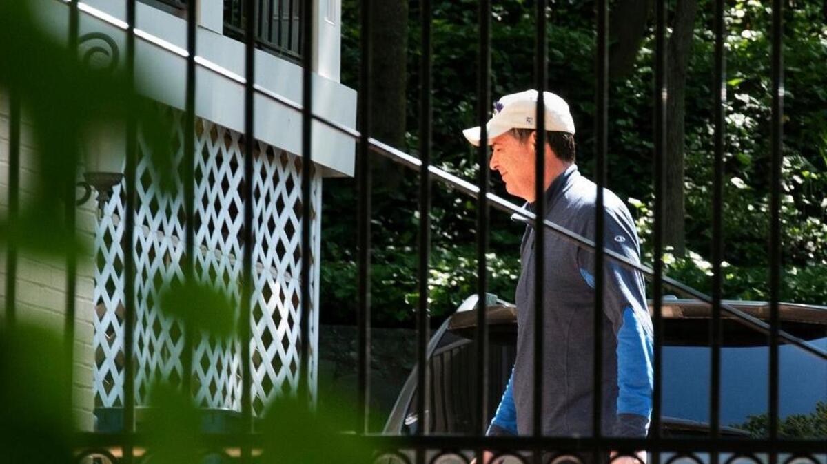 Former FBI Director James Comey walks at his home in McLean, Va., Wednesday, May 10, 2017. President Donald Trump fired Comey on Tuesday, ousting the nation's top law enforcement official in the midst of an investigation into whether Trump's campaign had ties to Russia's election meddling.