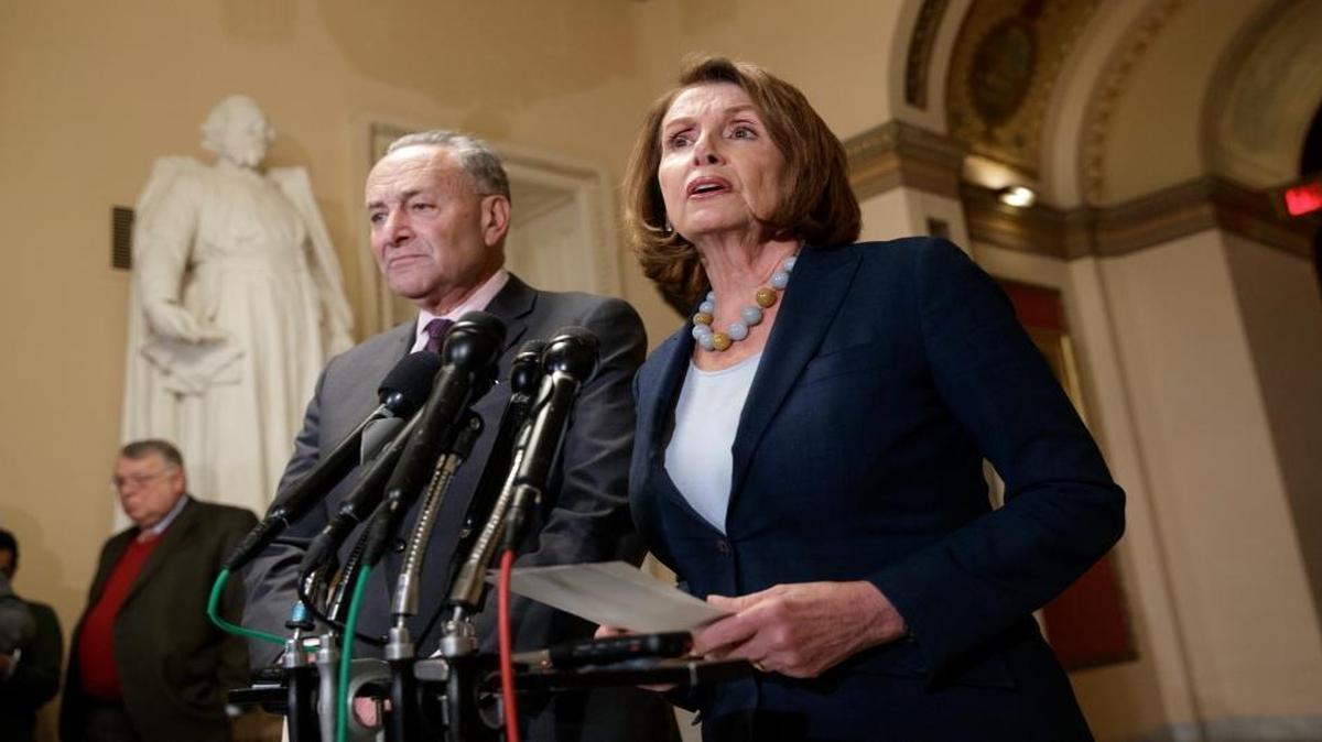 House Democratic leader Nancy Pelosi of California, and Senate Democratic leader Chuck Schumer of New York speak about the Congressional Budget Office projection that 14 million people would lose health coverage next year under the House Republican bill dismantling former President Barack Obama's health care law, on Capitol Hill in Washington, March 13, 2017.