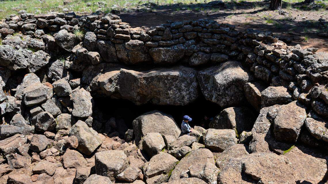 The entrance to Lava River Cave is shown. An 8-year-old boy was found nearly a day after he disappeared from the entrance.