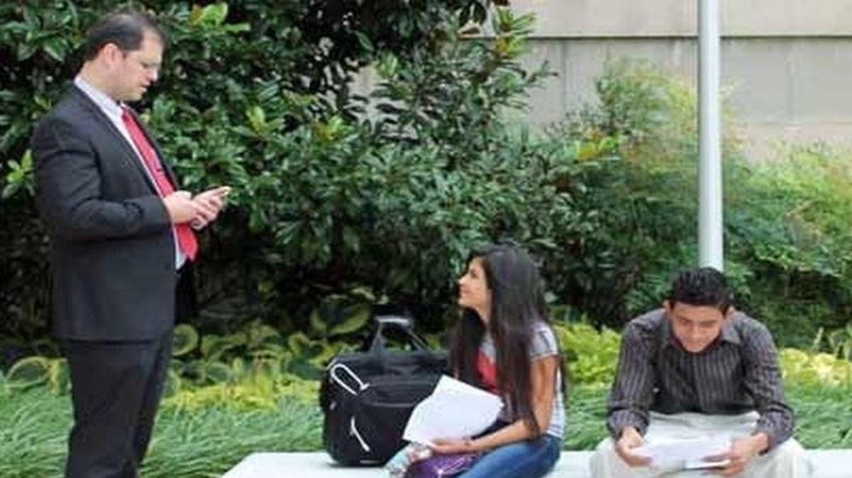 
Attorney Bryan Johnson accompanies child migrants who testified before Congress about humanitarian concerns on July 29, 2014 in Washington, D.C.
