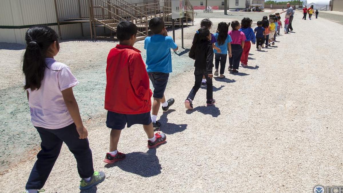 
Children walk to class at the South Texas Family Residential Center in Dilley, Texas.
