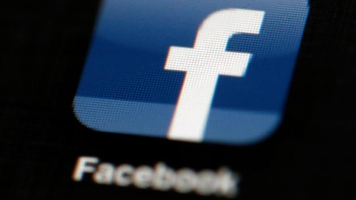 In this May 16, 2012, file photo, the Facebook logo is displayed on an iPad in Philadelphia.