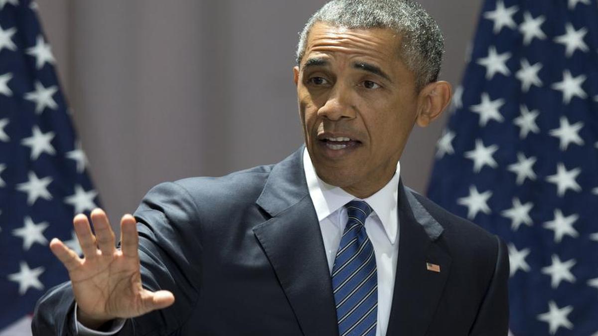 
President Barack Obama waves as he leaves the stage after speaking about the nuclear deal with Iran, Wednesday, Aug. 5, 2015, at American University in Washington. The president said the nuclear deal with Iran builds on the tradition of strong diplomacy that won the Cold War without firing any shots.
