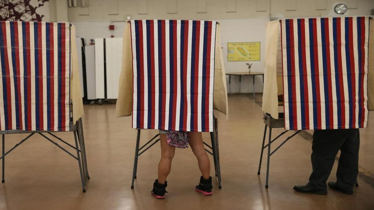 Voters cast their ballots at Farrington High School on Nov. 8, 2016, in Honolulu. This November, the Supreme Court will hear a case on Ohio’s method of purging names from its voter rolls, which opponents say is overly aggressive.