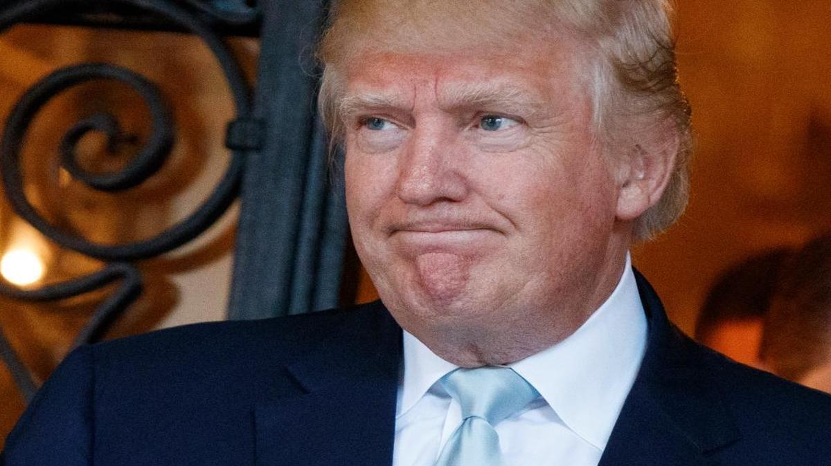 President-elect Donald Trump, seen in this Dec. 28, 2016, photo, talks to reporters at Mar-a-Lago in Palm Beach, Fla.