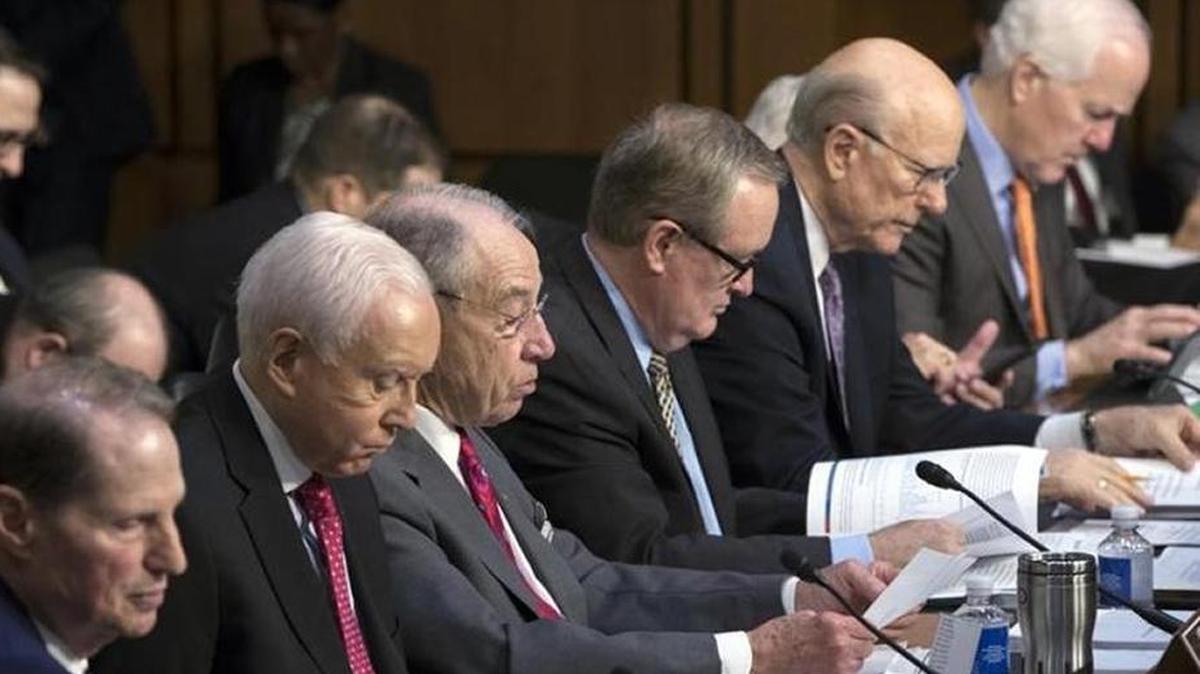 Members of the Senate Finance Committee consider the Republican tax overhaul legislation, which is now headed for debate by the full body on the Senate floor.