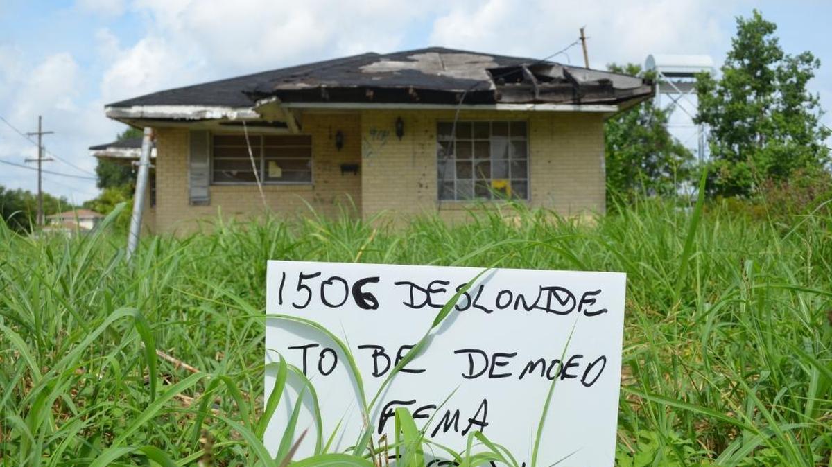Despite recent economic progress in the city, abandoned properties dot New Orleans, a decade after Hurricane Katrina made landfall Aug. 29, 2005, swamping about 80 percent of the city. This house, shown on Aug. 11, 2015, is in the city's Ninth Ward. Ten years after the storm, the city has largely rebounded, although significant problems remain.
