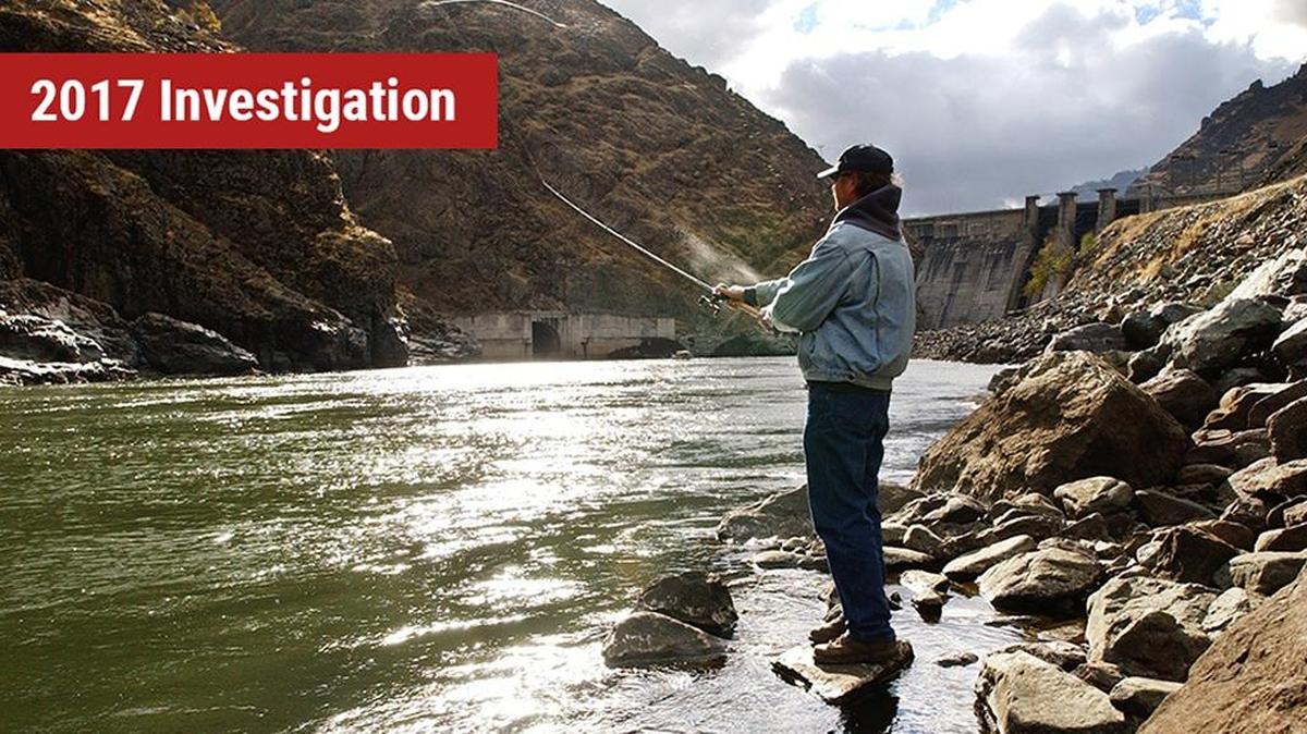 In 2008, Larry McBrom of Baker City, Ore., fishes for steelhead below Hells Canyon Dam. Salmon runs above the dams have vanished, but steelhead from Idaho Power’s hatchery programs run upriver to Hells Canyon Dam.