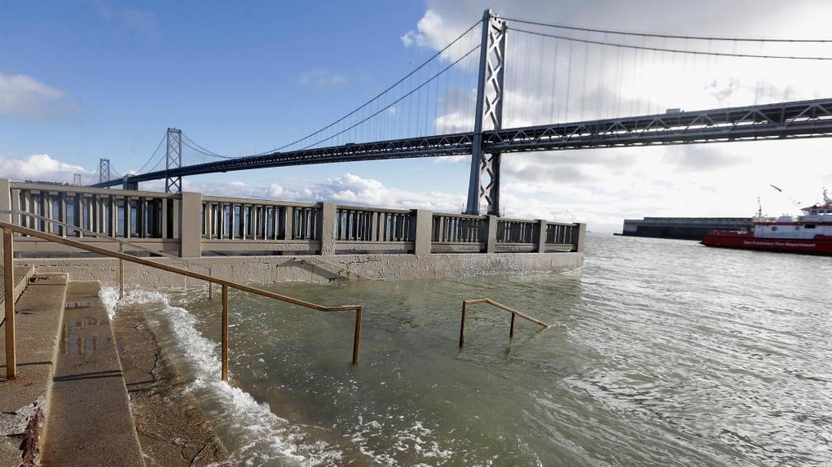 Water from a king tide floods a staircase along the Embarcadero in San Francisco on Jan. 11, 2017. Scientists are recording ever-higher king tides on coasts nationwide, partly because of sea-level rise, and also because of efforts by citizen volunteers to photograph the flooding. King tides are higher than normal high tides. They occur when the earth, sun and moon are in alignment, with the moon closest to the earth during its elliptical orbit.