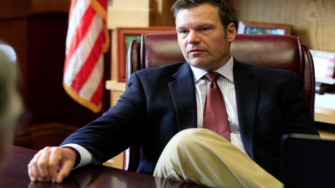 In this May 17, 2017, file photo, Kansas Secretary of State Kris Kobach talks with a reporter in his office in Topeka, Kan. Kobach, who is helping lead President Donald Trump's commission on election fraud announced Thursday, June 8, 2017, that he's running for the Republican nomination for governor.