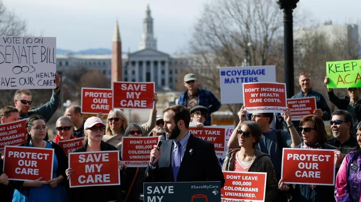 Supporters of the Affordable Care Act, who are also opponents of Colorado's GOP-led plan to undo Colorado's state-run insurance exchange, rally on the state Capitol steps in Denver, Tuesday, Feb. 7, 2017.