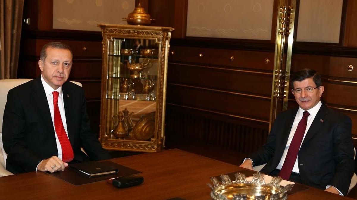 
Turkey's President Recep Tayyip Erdogan, left, with Prime Minister Ahmet Davutoglu before a meeting in Ankara, Turkey, Tuesday, Aug. 25, 2015. Erdogan on Tuesday appointed Davutoglu to form an interim government that will lead the country into a new election, likely to take place on Nov. 1. Erdogan formally called for a new election late on Monday, following an inconclusive vote in June, and the collapse of coalition-building efforts. 
