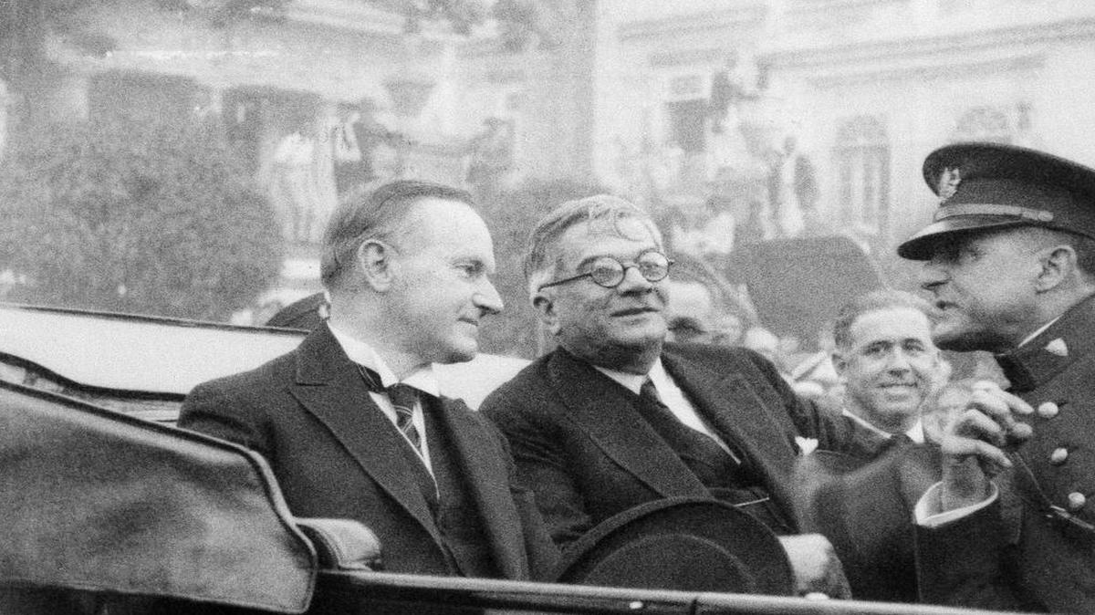 In this handout from Paramount News/Pictures, President Calvin Coolidge and President Gerardo Machado of Cuba, ride in the back of a car in Cuba, Jan. 17, 1928. Exact location is unknown.