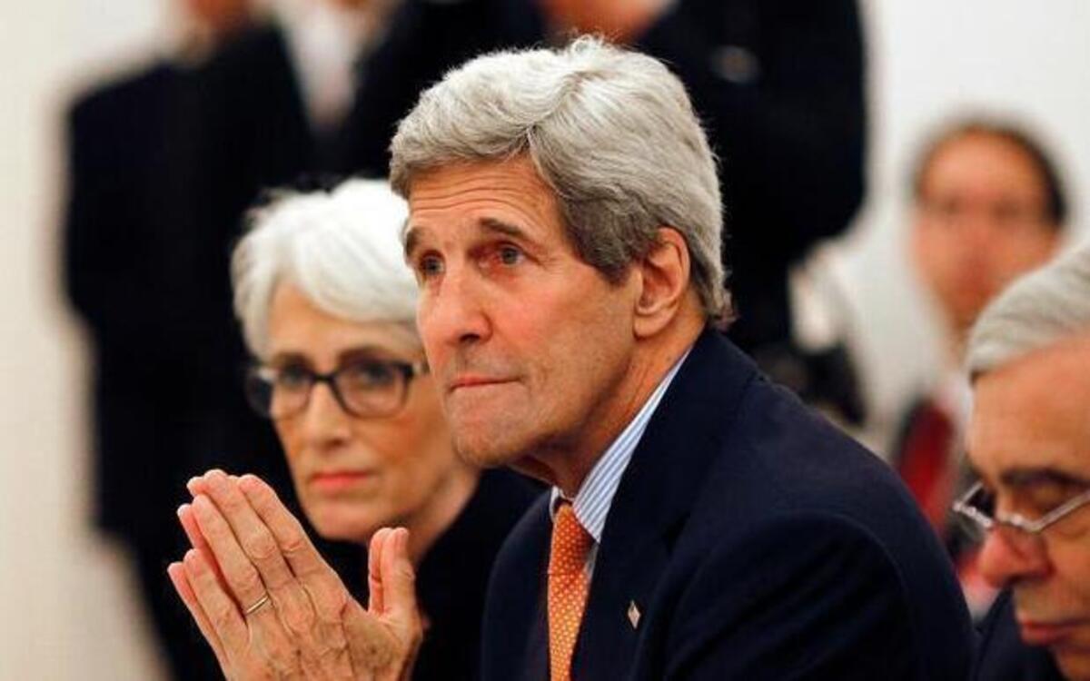 
U.S. Secretary of State John Kerry meets with foreign ministers of Germany, France, China, Britain, Russia and the European Union at a hotel in Vienna, Austria, Tuesday. Negotiators agreed to yet another extension of the deadline for completion of the talks. The new deadline is Friday.

