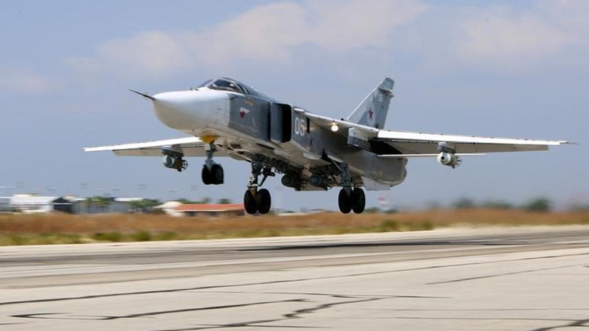 
A Russian SU-24 jet fighter takes off Saturday at the Hmeimim airbase in Syria. A similar aircraft crossed into Turkish airspace on Sunday.
