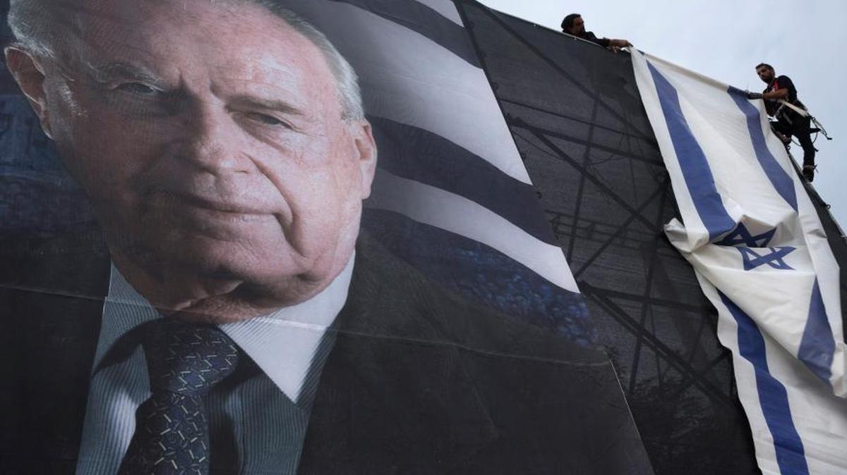 A portrait of late Israeli Prime Minister Yitzhak Rabin has been hung in the square where he gave his final speech before being 20 years ago. President Bill Clinton, who oversaw the signing of the Oslo Accords between Rabin and PLO Chairman Yasser Arafat, will speak there on Saturday.