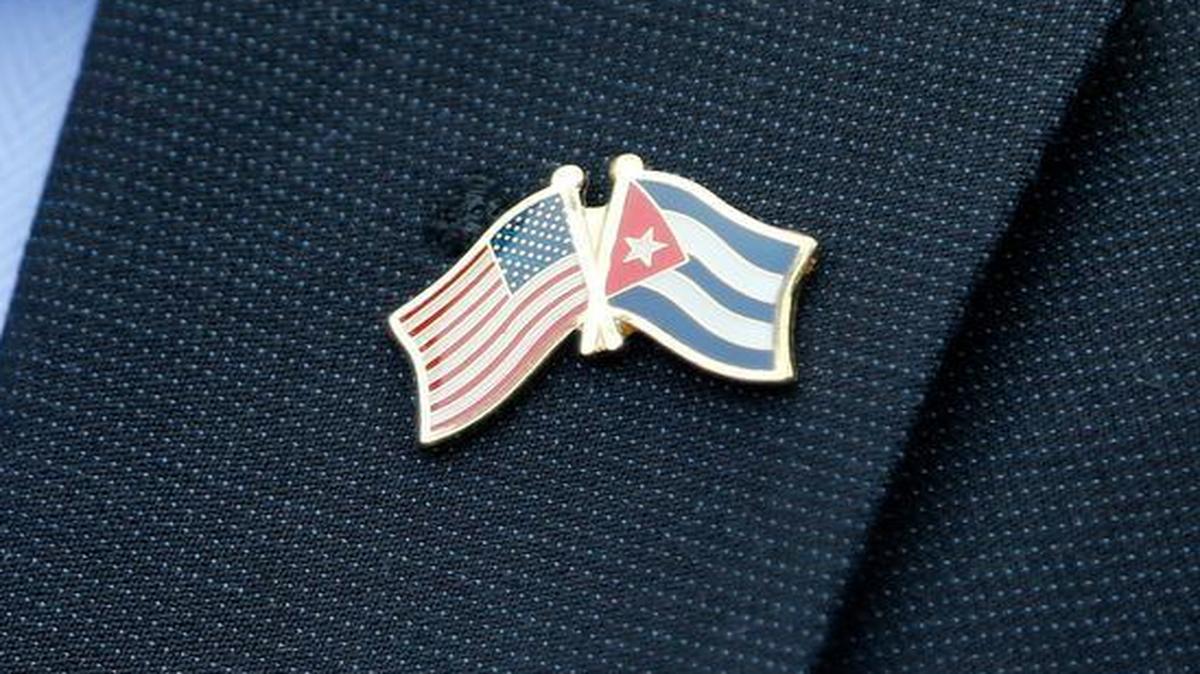 
A flag pin worn by a member of a U.S. Senate delegation in Havana, Cuba, represents the two countries moving toward normalizing relations. Much work remains to be done. Embassies are to be reopened July 20.
