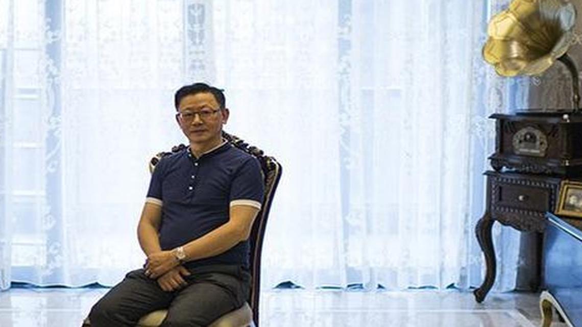 
Long Wenjun, son of Long Qiming, sits in his apartment in Chongqing, China, on Aug. 13, 2015. Wenjun’s father helped defend China as a pilot during World War II. After the communists came to power, Qiming was suspected of being a spy, because he had been born in British-ruled Hong Kong and been trained as a pilot in the United States.
