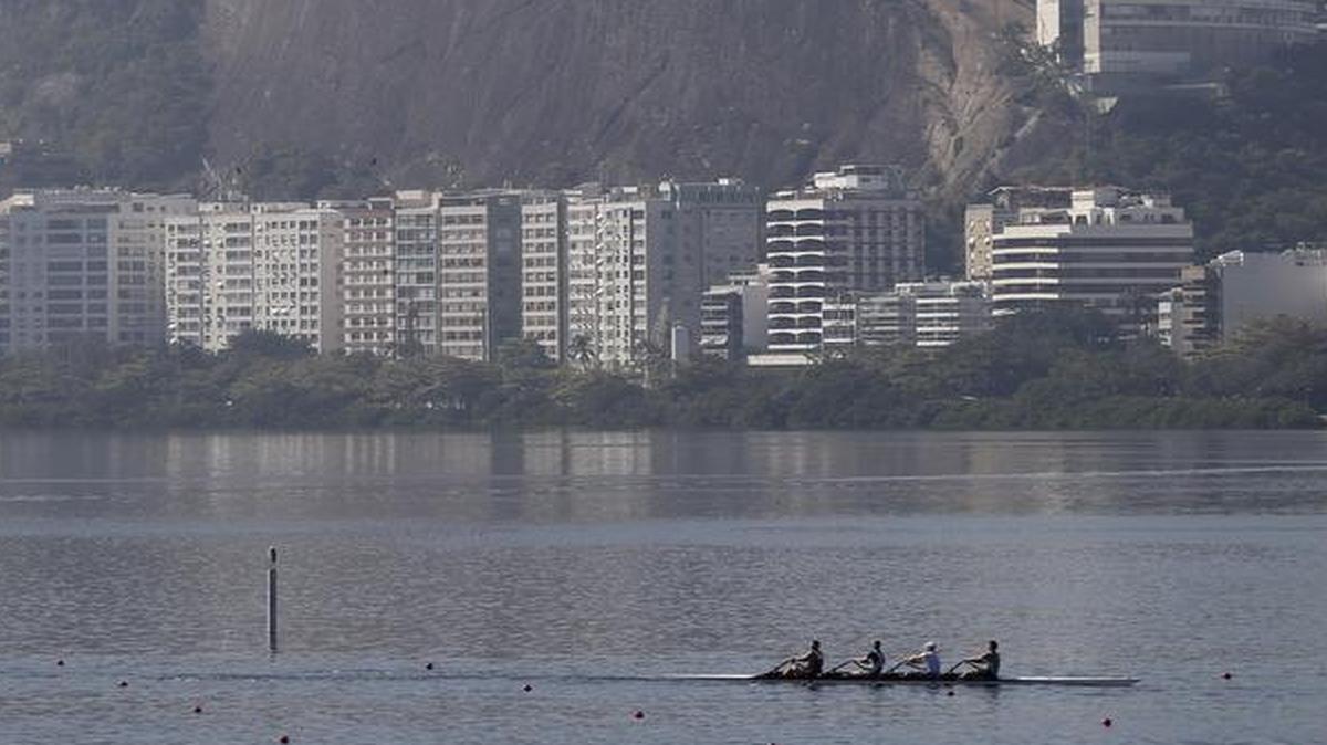 
Rowers practice on Rodrigo de Freitas lake in Rio de Janeiro, Brazil, Aug. 4, 2015. The head of the governing body of world rowing says he will ask for viral testing at the rowing venue for next year's Rio Olympics, and says he expects all other water sports in Rio to follow suit. The move comes after an Associated Press investigation last week showed a serious health risk to Olympic athletes who will compete at water venues around Rio that are rife with human waste and sewage.
