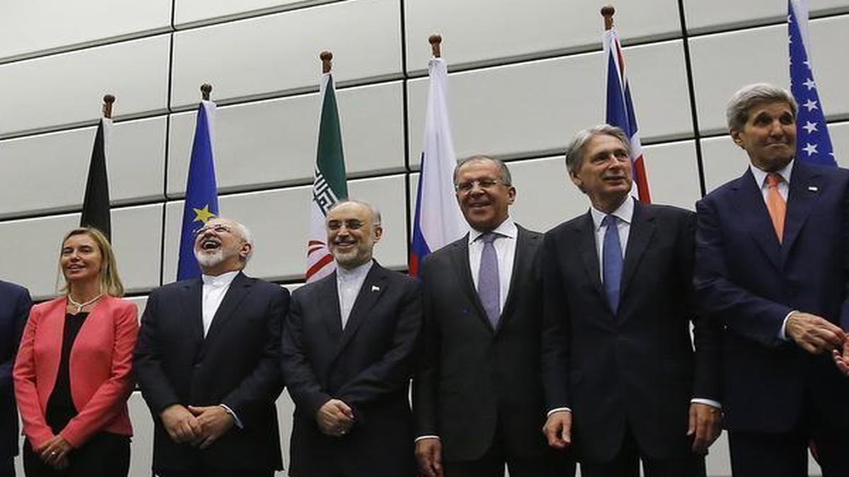 
The foreign ministers of the P5+1 and Iran stood for a group photo at the United Nations building in Vienna on Tuesday after the announcement of a landmark deal. 
