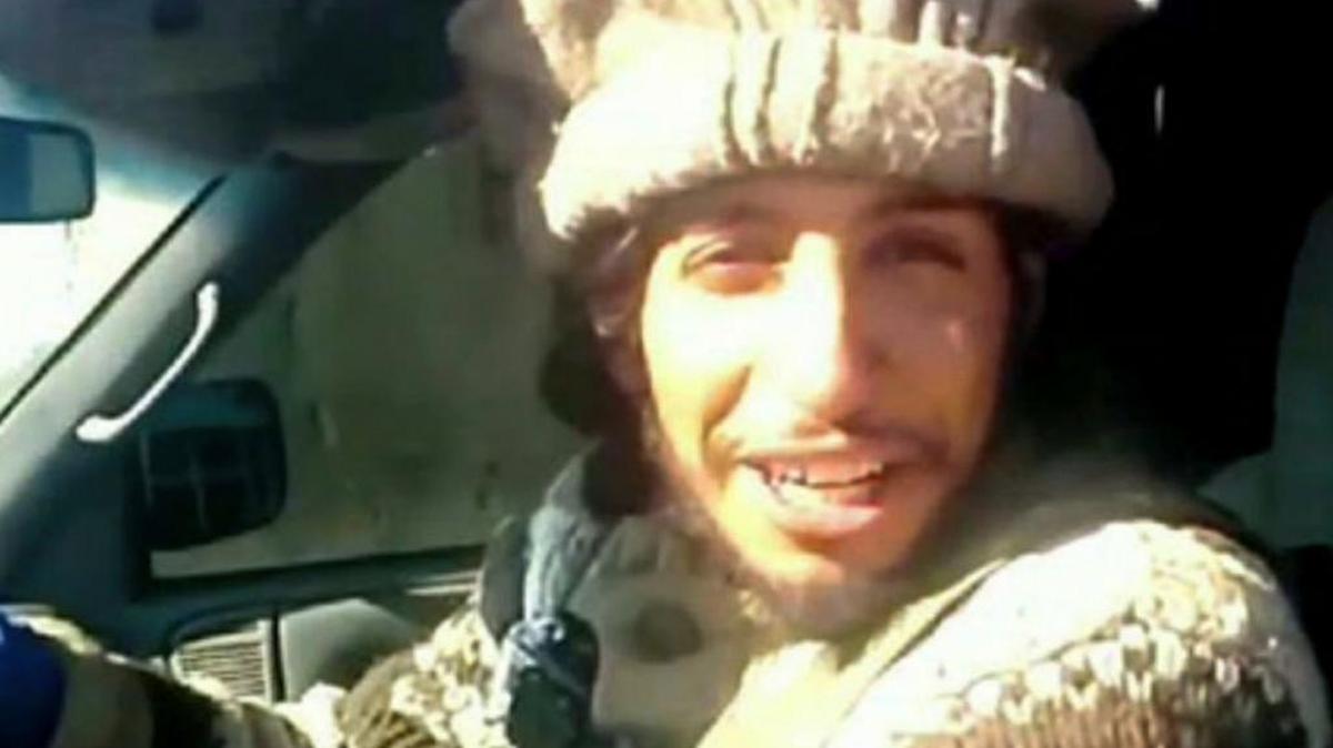 This undated image taken from a Militant Website on Monday, Nov.16, 2015, shows Belgian Abdelhamid Abaaoud. A senior police official said he was believed to be inside the apartment in the Paris suburb of Saint-Denis that police raided early Wednesday.