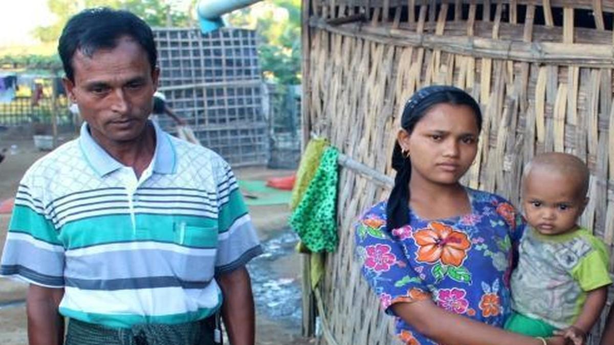 Abu Seedik and some of his family outside their thatched hut in the Da Paing refugee camp outside Sittwe, the capital of Myanmar’s Rachine state. Seedik lost his home and youngest daughter when mobs set fire to his house during sectarian violence in June 2012. He and his family have been living in the camp since.