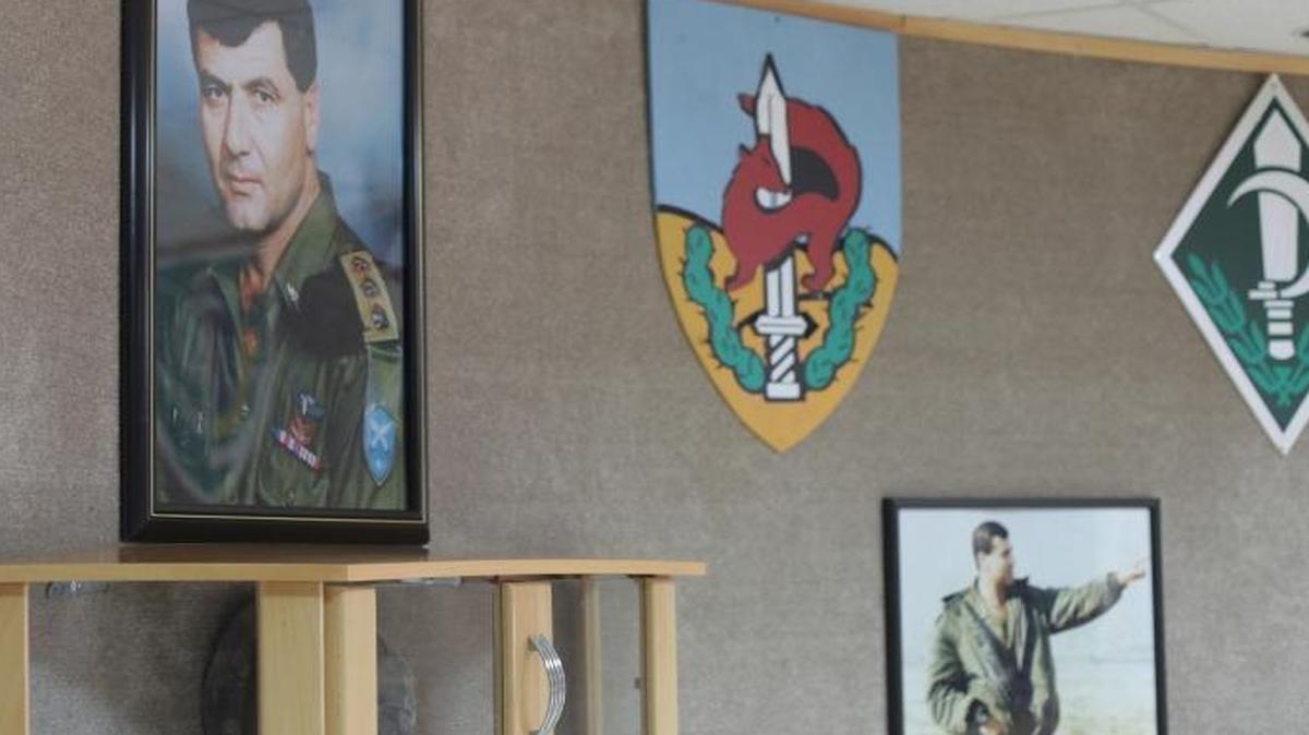 
A shrine to the first Druze to serve as an Israeli paratrooper in the village of Hurfeish. Two Druze from the Golan Heights were charged Monday with a fatal attack on an ambulances carrying wounded Syrian rebels to Israeli hopsitals. The Druze say Israel should not provide medical care to people who may be members of the Nusra Front that is murdering Syrian Druze. 
