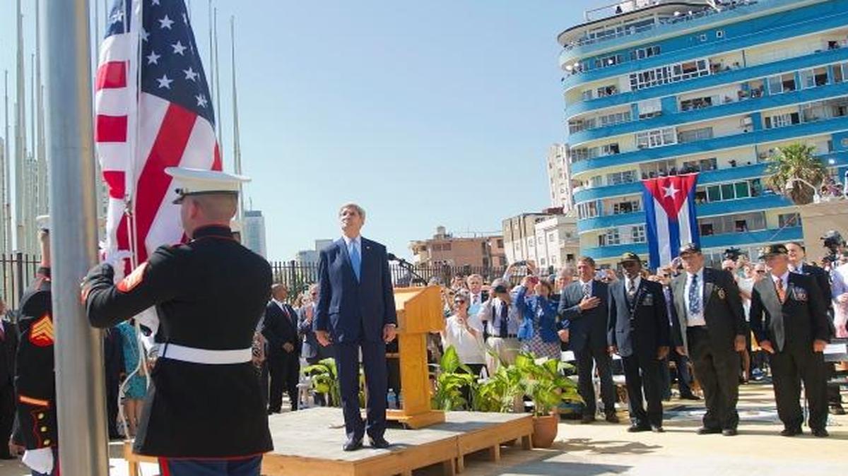
Secretary of State John Kerry watchew as U.S. Marines raise the U.S. flag over the reopened embassy in Havana Friday.
