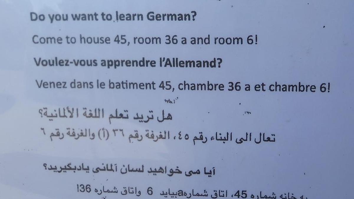 
A sign offering German lessons at the Munich reception center, a former military barracks that now houses 1,500 asylum seekers awaiting rulings on their cases. 

