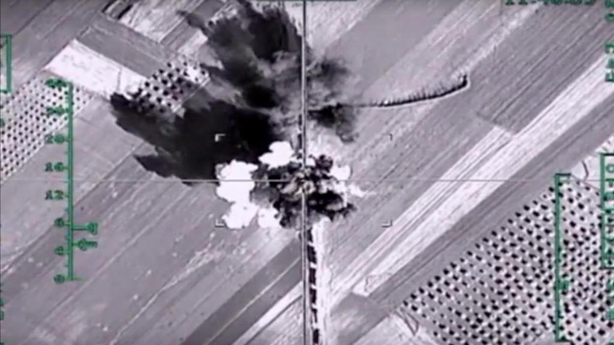 The Russian Defense Ministry posted this image on its website showing a column of heavy trucks carrying ammunition being hit by a Russian airstrike near Aleppo, Syria. Russia reported striking 100 times as many targets as the U.S.-led coalition in Syria over the past week.