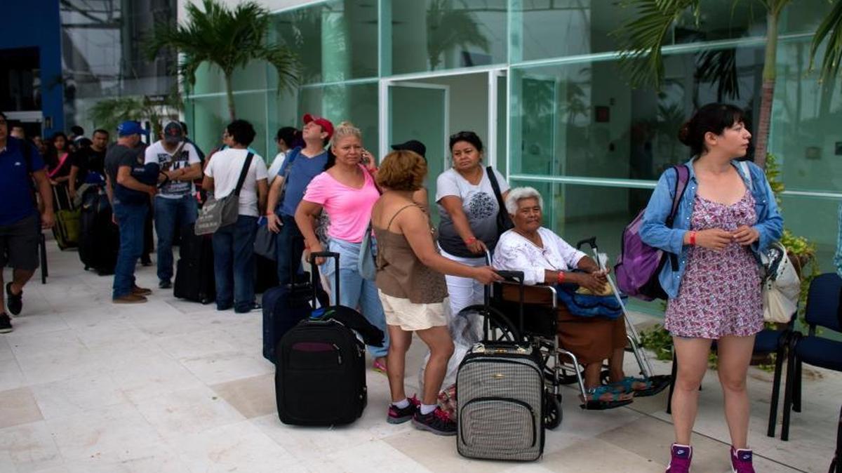 Mexican and international tourists in Puerto Vallarta, Mexico, waited for buses Friday to transport them to a shelter ahead of Hurricane Patricia’s expected landfall.