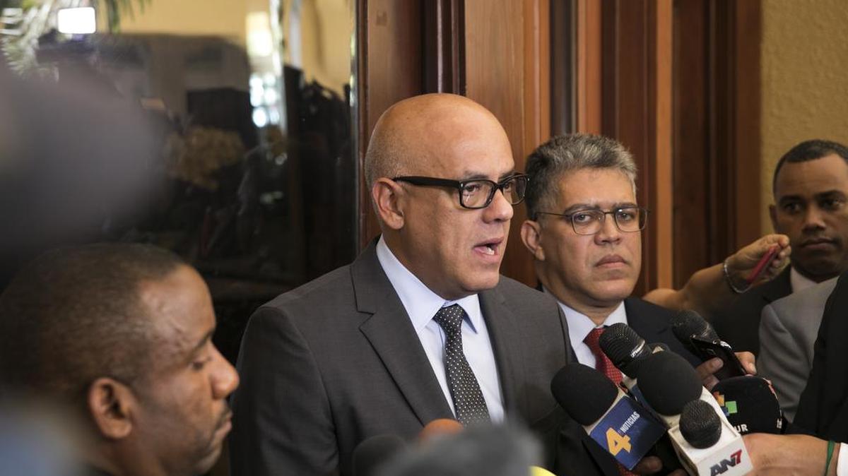 Venezuelan Minister of Communications Jorge Rodriguez speaks to the press at the Ministry of Foreign Affairs, before taking part in negotiations aimed at resolving Venezuela's ongoing economic and political crisis, in Santo Domingo, Dominican Republic, Friday, Dec. 1, 2017.